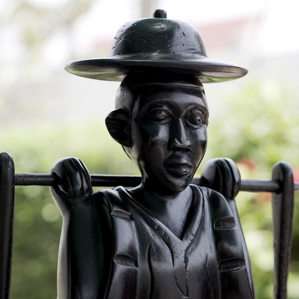 Alternate image for Handmade  Hand Painted Water Carrier Wood Sculpture Bearing Water