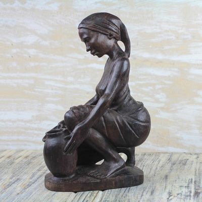 Alternate image for Signed Ebony Wood Sculpture of a Woman Collecting Water Collecting Water