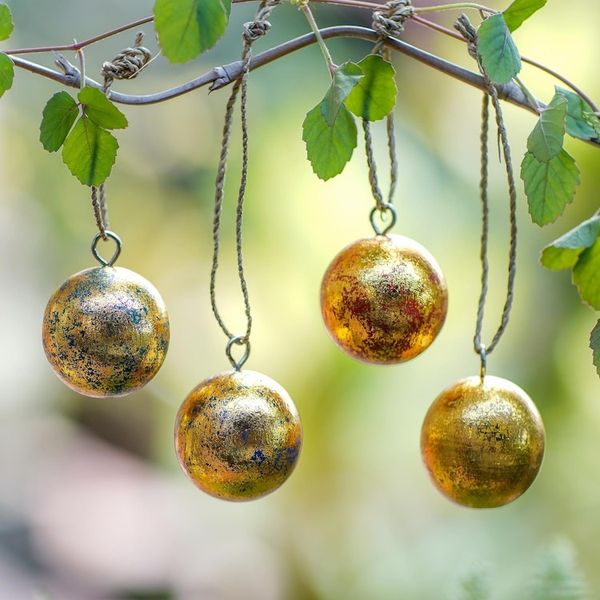 Alternate image for Four Round Gold Tone Albesia Wood Ornaments from Bali Golden Baubles