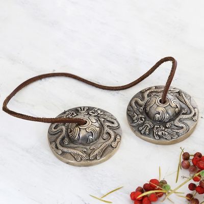 Alternate image for Leather-Accented Brass Meditation Cymbals Safe and Sound