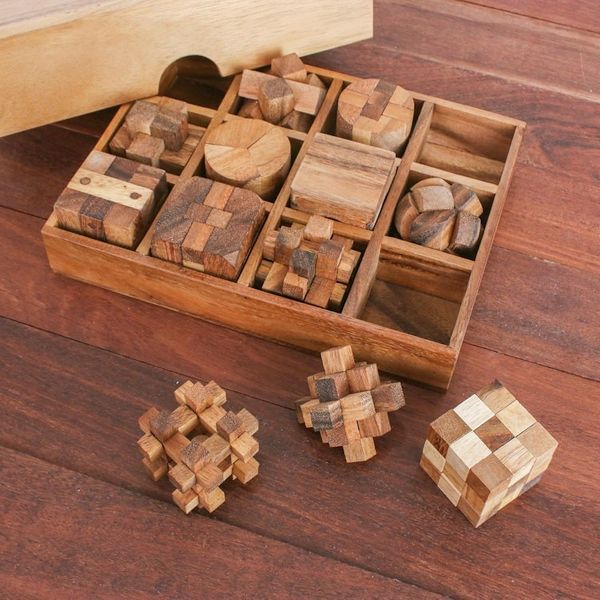 Alternate image for 12 Handcrafted Wood Puzzles with Box from Thailand Array of Challenges