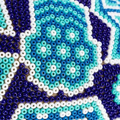 Alternate image for Huichol Beadwork Blue Starburst Skull Figurine Blue Night Visions