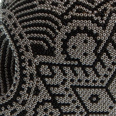 Alternate image for Black and Grey Beaded Skull Figurine with Huichol Symbols Our Children