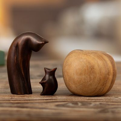 Alternate image for Hand-Carved Cedarwood Sculptures from Peru Pair Perfect Opposites