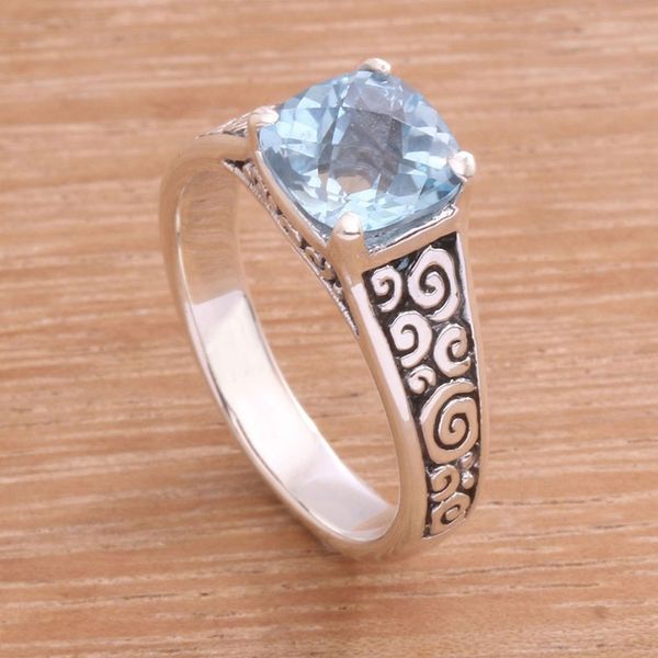Alternate image for Blue Topaz and Sterling Silver Swirl Motif Solitaire Ring Sparkling Heavens