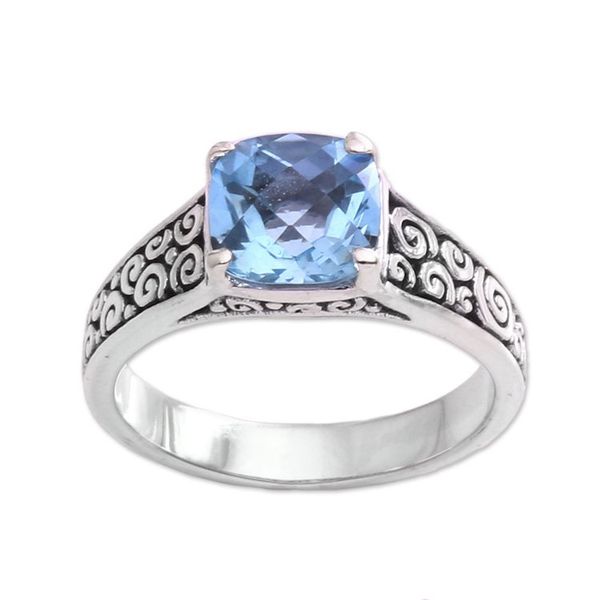 Alternate image for Blue Topaz and Sterling Silver Swirl Motif Solitaire Ring Sparkling Heavens