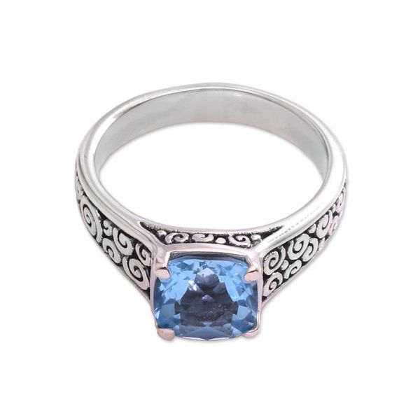 Alternate image for Blue Topaz and Sterling Silver Swirl Motif Solitaire Ring Sparkling Heavens