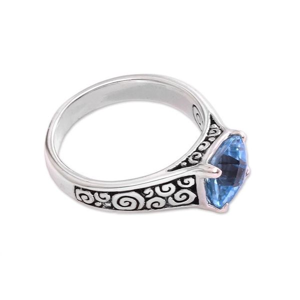 Alternate image for Blue Topaz and Sterling Silver Swirl Motif Solitaire Ring Sparkling Heavens