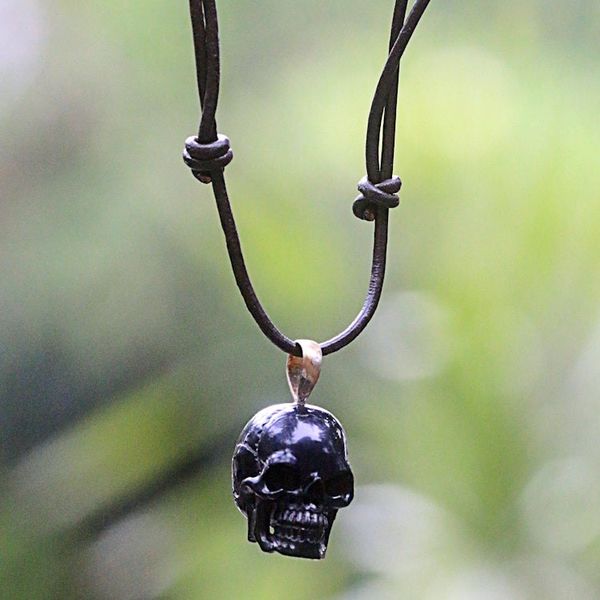 Alternate image for Carved Bone Skull Pendant on Cord Handmade in Indonesia Black Skull