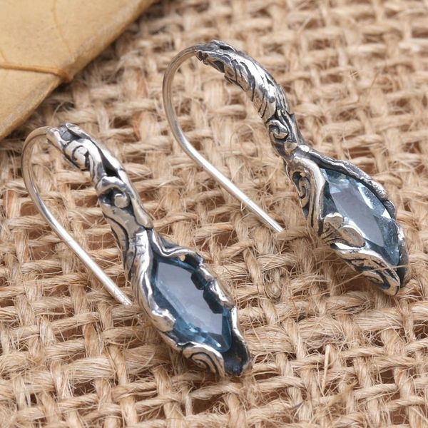 Alternate image for Hand Made Blue Topaz and Sterling Silver Drop Earrings Blue Cocoon