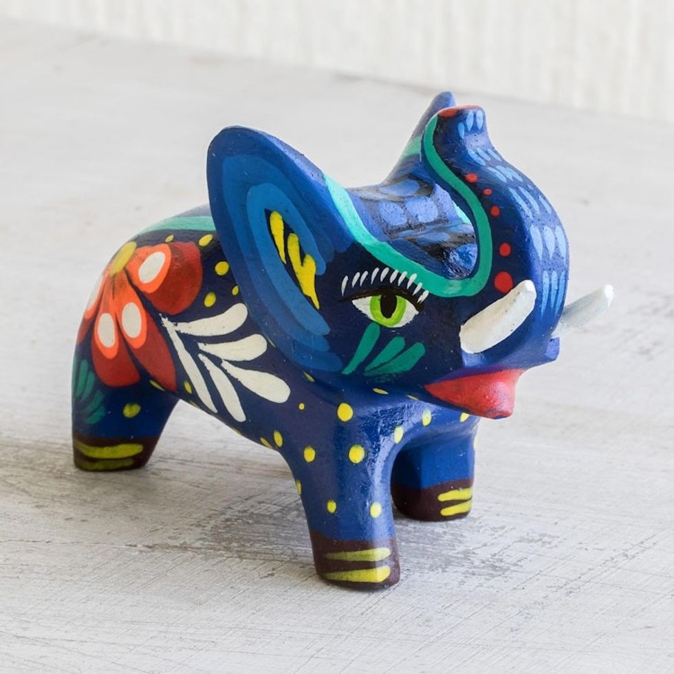 Small Wood Hand Painted Elephant Figurine 'Unstoppable Force'