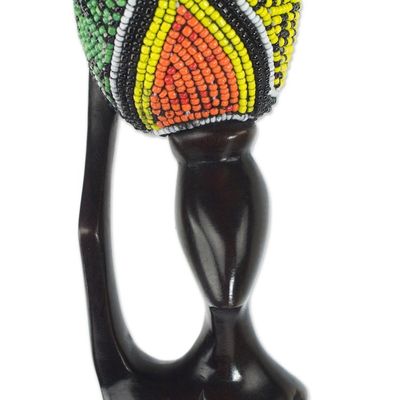 Alternate image for Handmade Ghanaian Ebony Wood and Recycled Glass Sculpture Akatua