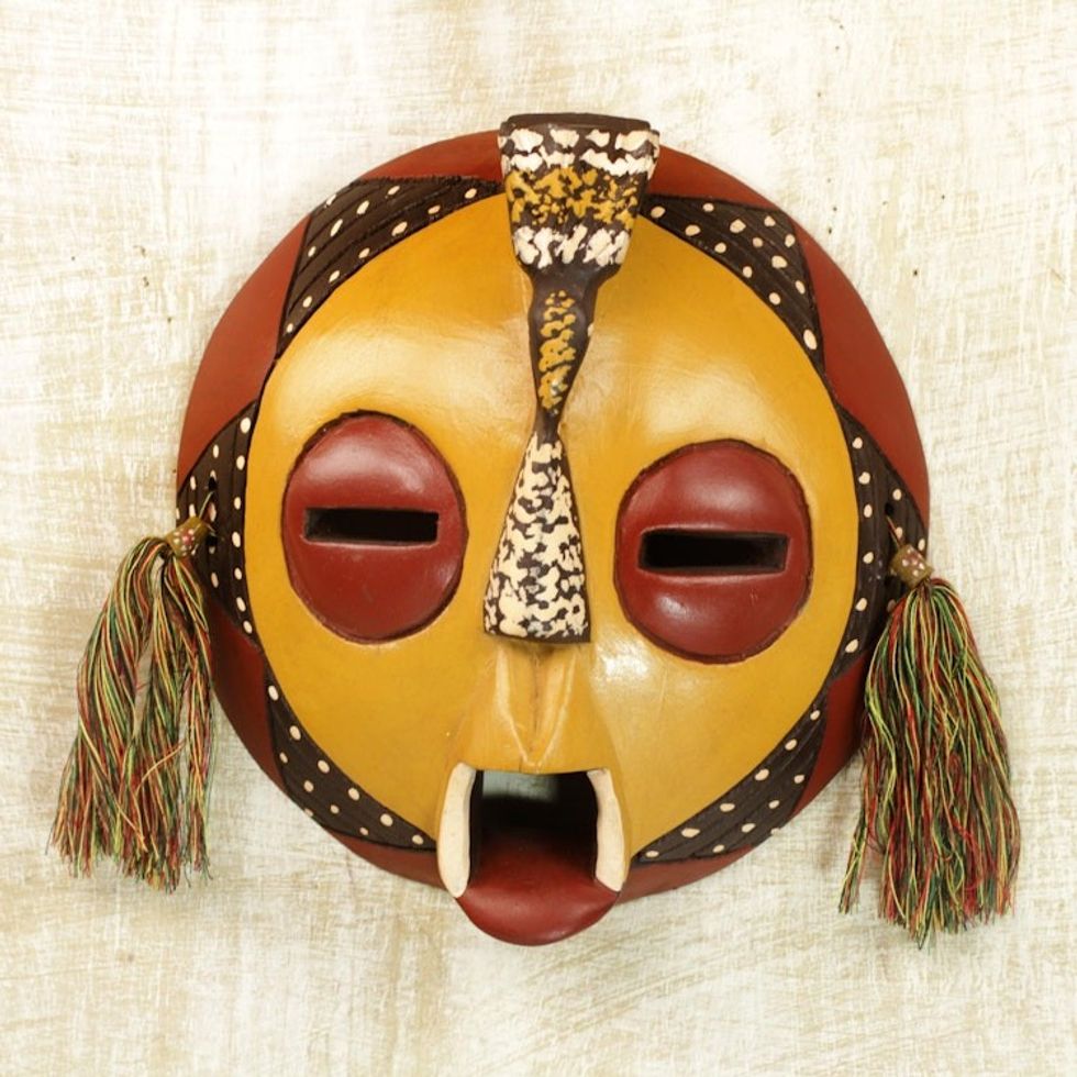 Handcrafted Yellow Sese Wood Wall Mask from Ghana 'Calm One'