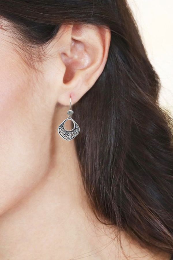 Alternate image for Balinese Silver Dangle Earrings with Blue Topaz Gemstones Blooms in Bali