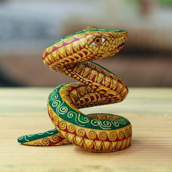 Alternate image for Hand-Painted Amber Copal Wood Alebrije Snake Figurine Amber Hiss