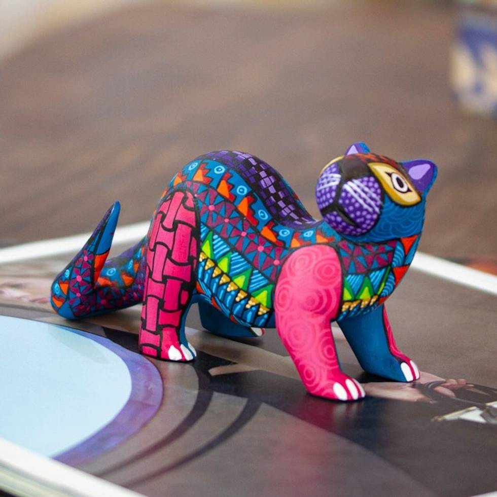 Carmine Copal Wood Alebrije Otter Figurine Painted by Hand 'The Water Spirit in Carmine'
