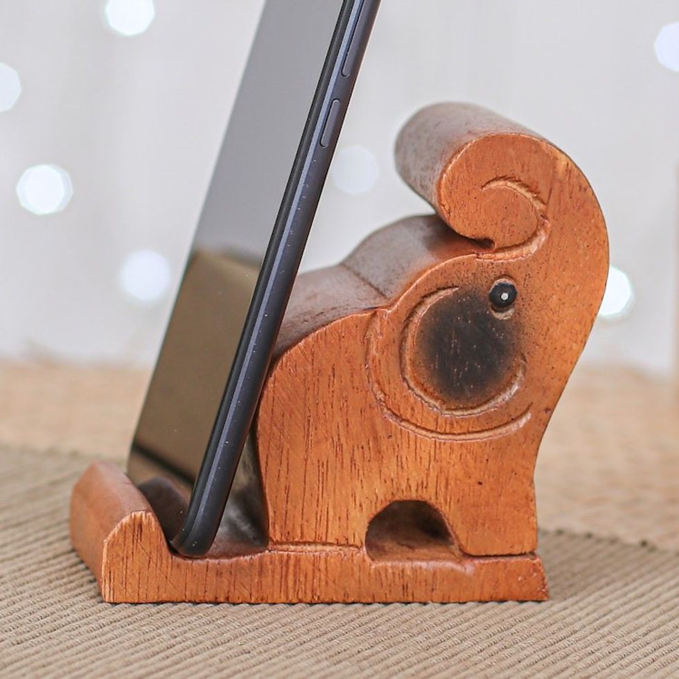 Hand-Carved Brown Elephant Raintree Wood Phone Holder 'Gentle Assistant'