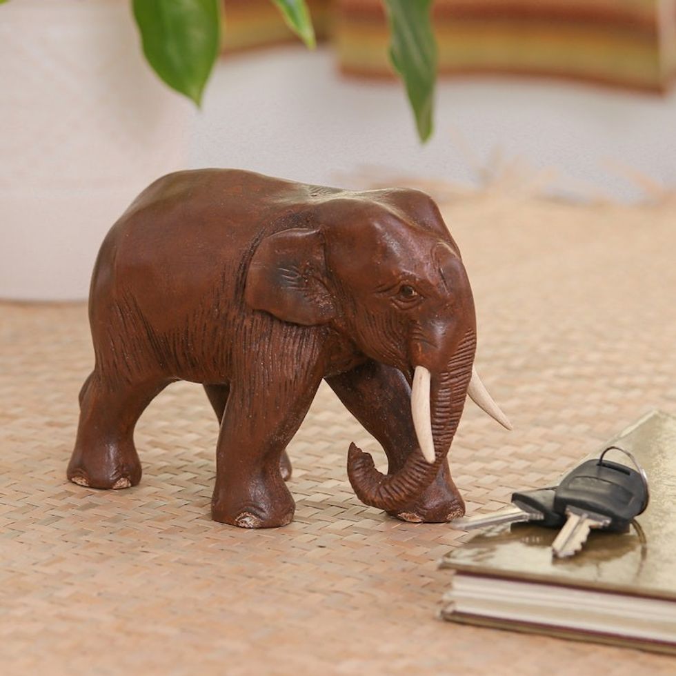 Teak sculpture 'Purposeful Elephant'