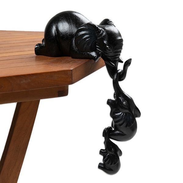 Alternate image for Handmade Elephant Suar Wood Sculptures in Black Set of 3 Nocturnal Family Fun