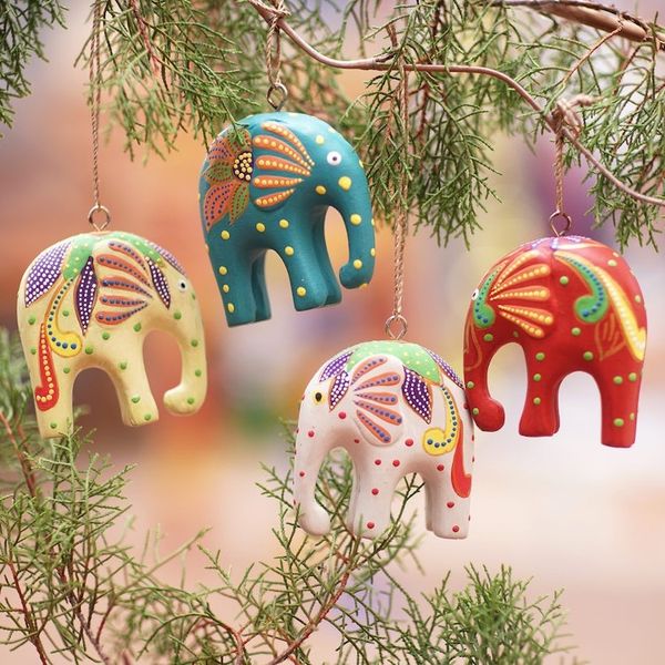 Alternate image for Handcrafted Elephant Wood Ornaments from Bali Set of 4 Happy Trunks