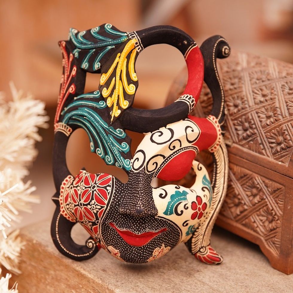 Handcrafted Nature-Themed Batik Pule Wood Mask from Java 'Infinite Woman'