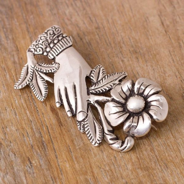 Alternate image for Peruvian Silver Brooch of a Hand Clutching a Flower Natural Universe