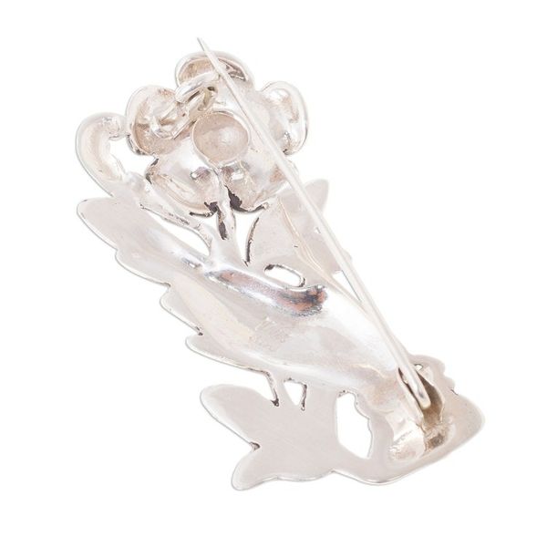 Alternate image for Peruvian Silver Brooch of a Hand Clutching a Flower Natural Universe