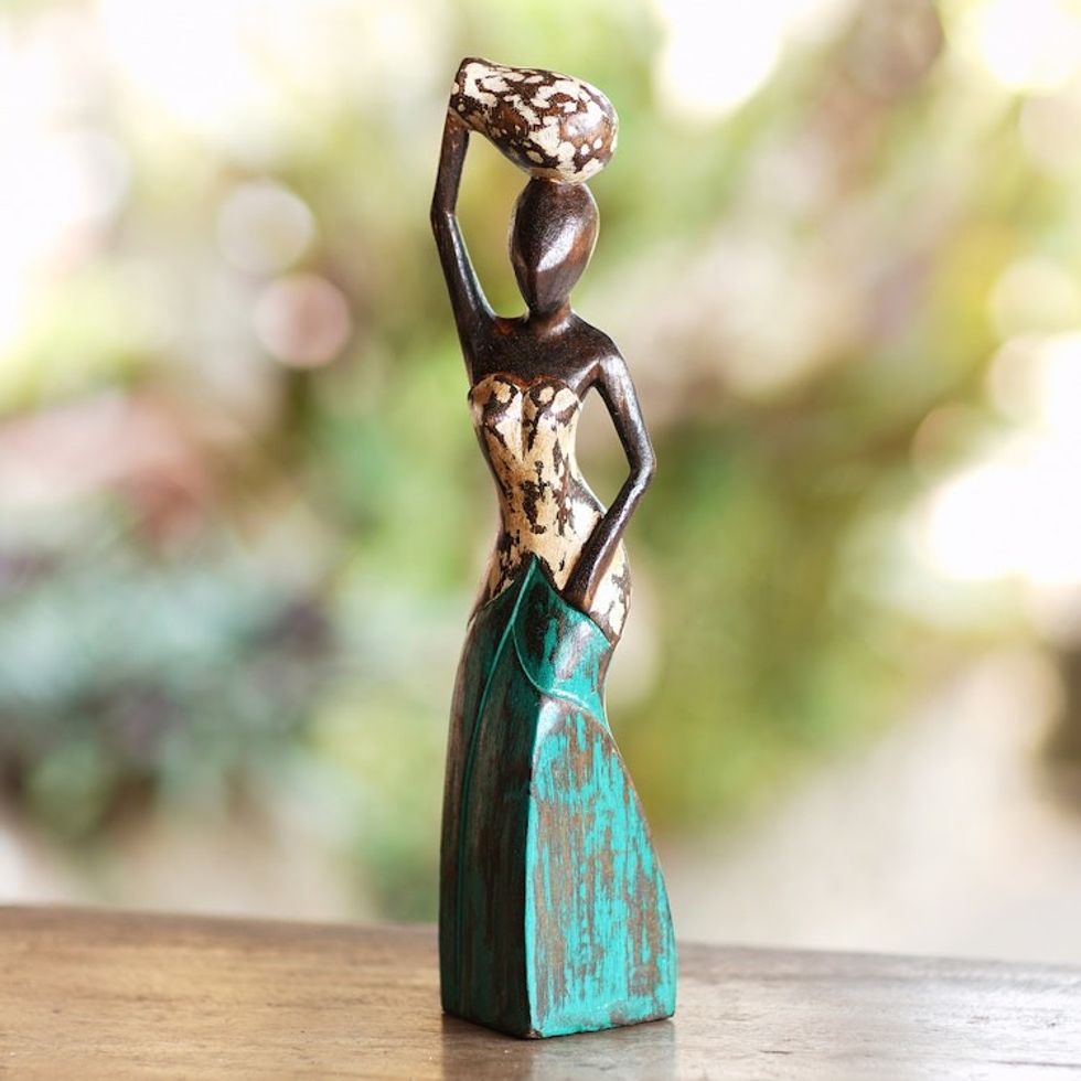 Wood sculpture 'Fetching Water II'