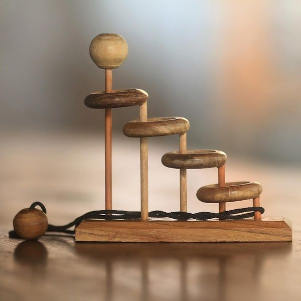 Alternate image for Artisan Crafted Teak Wood Desktop Puzzle Game from Java Magic Knot