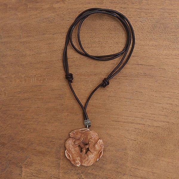 Alternate image for Hand-Carved Bone Rabbit Pendant Necklace from Bali Bunny Family