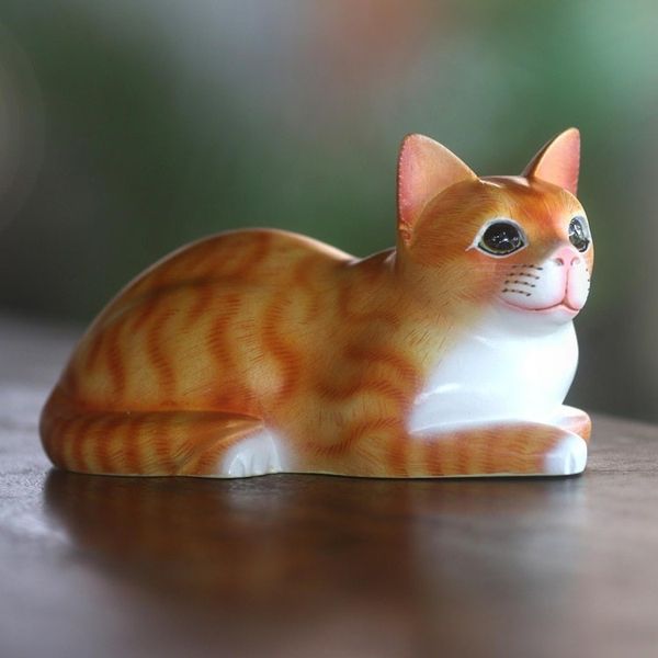Alternate image for Signed Wood Sculpture of a Lying Cat in Orange from Bali Lying Cat in Orange