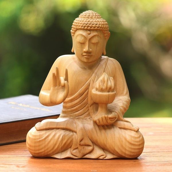 Alternate image for Hand-Carved Wood Sculpture of Buddha Holding Fire Buddhas Fire