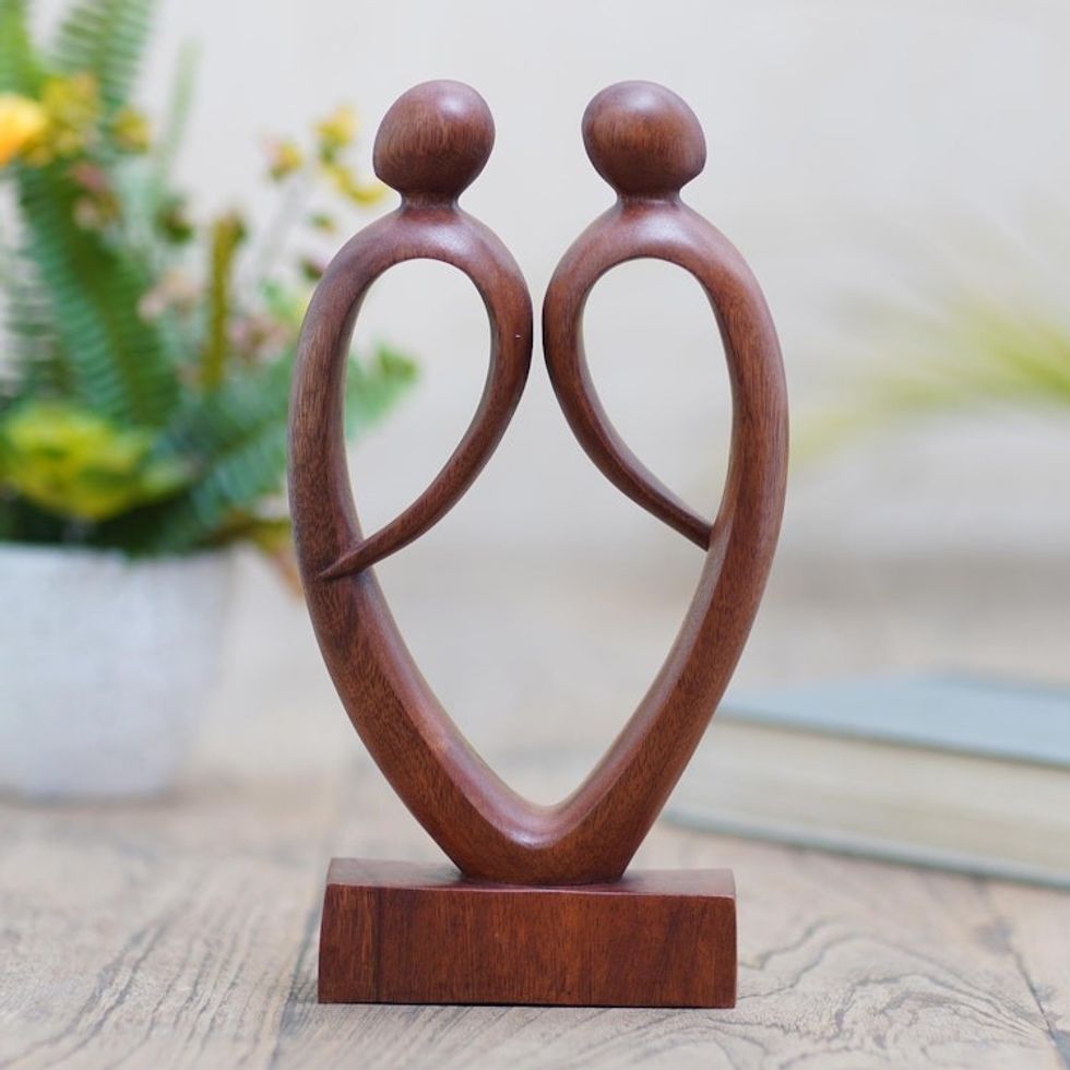 Artisan Made Suar Wood Figure Sculpture 'Unmatched'