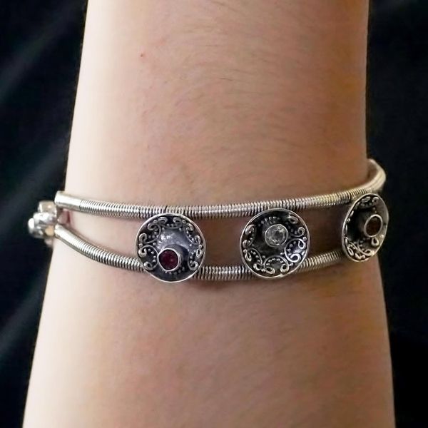 Alternate image for Garnet and Blue Topaz Pendant Bracelet from Java Cup of Love