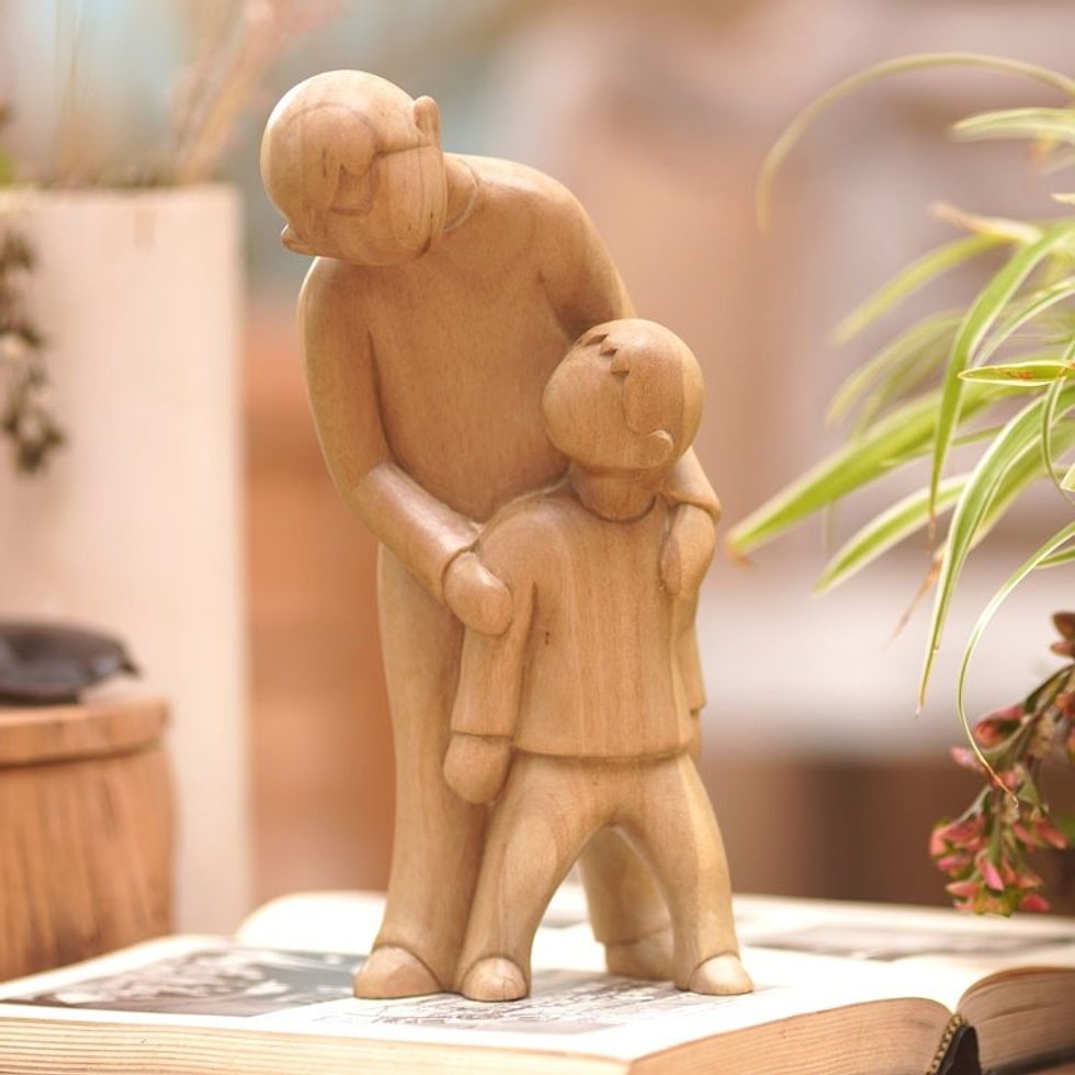 Artisan Crafted Hibiscus Wood Statuette 'Learning Lessons'