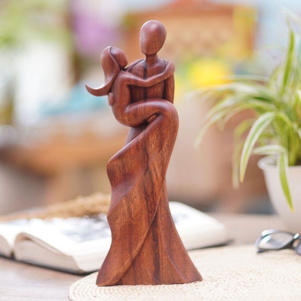 Artisan Crafted Suar Wood Statuette from Bali 'Swept Up'