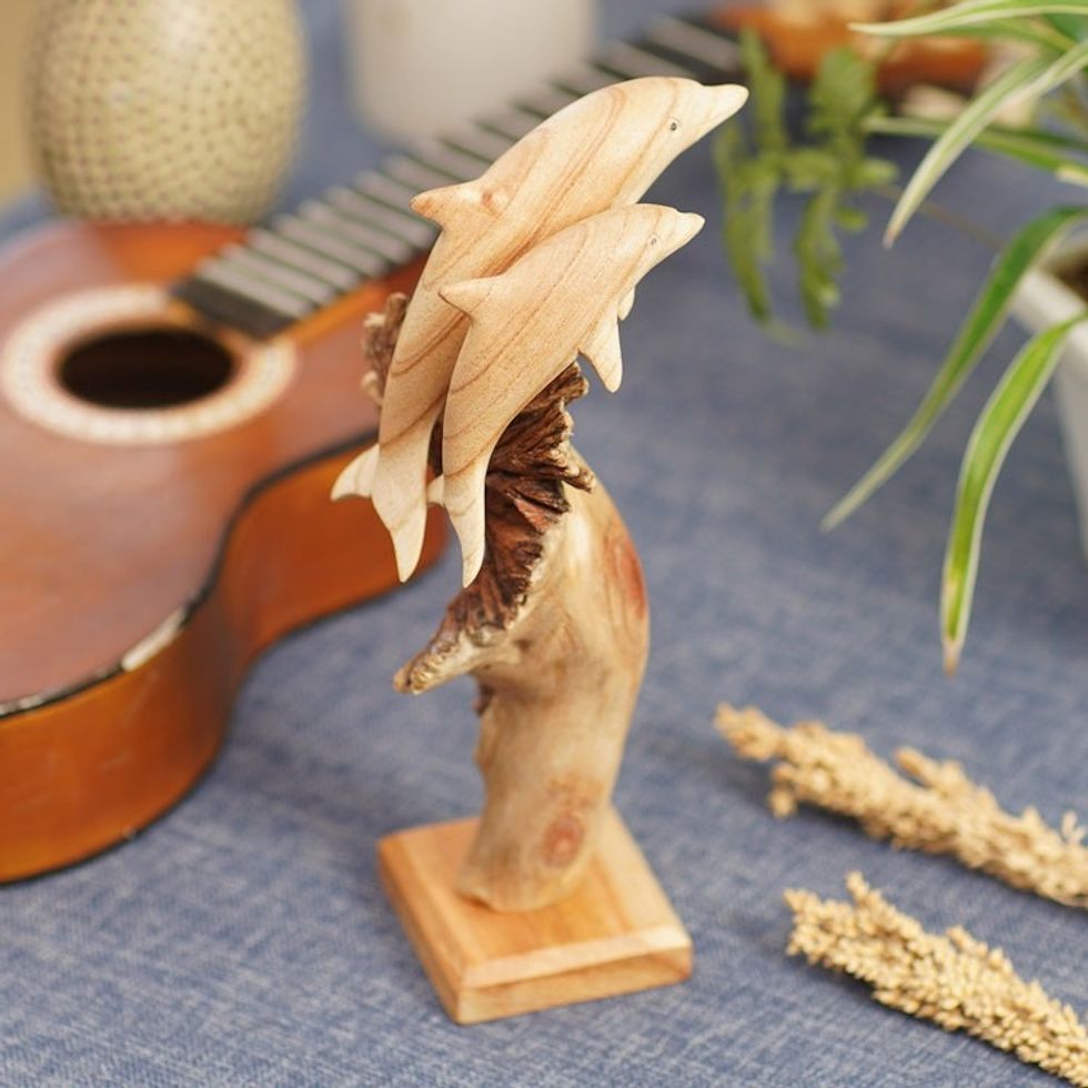 Carved Jempinis Wood Dolphin Sculpture with Natural Base 'Mother Dolphin'