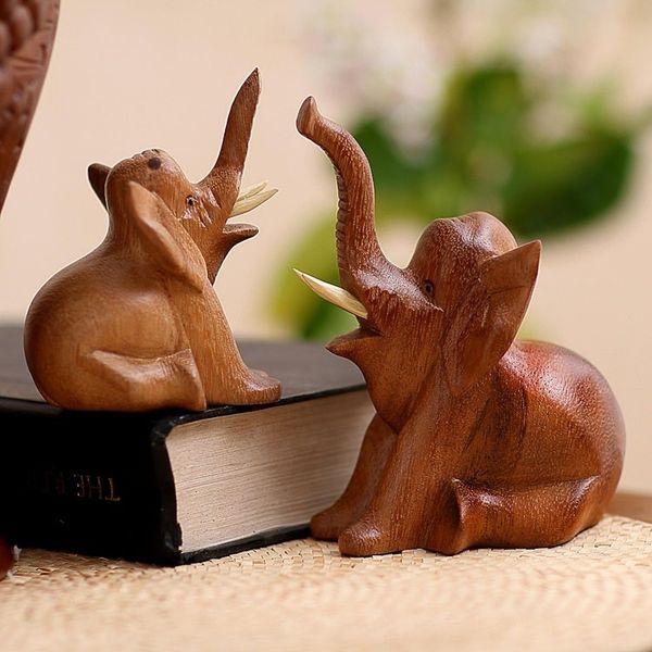 Alternate image for Hand Carved Suar Wood Elephant Statuettes Pair Play Date