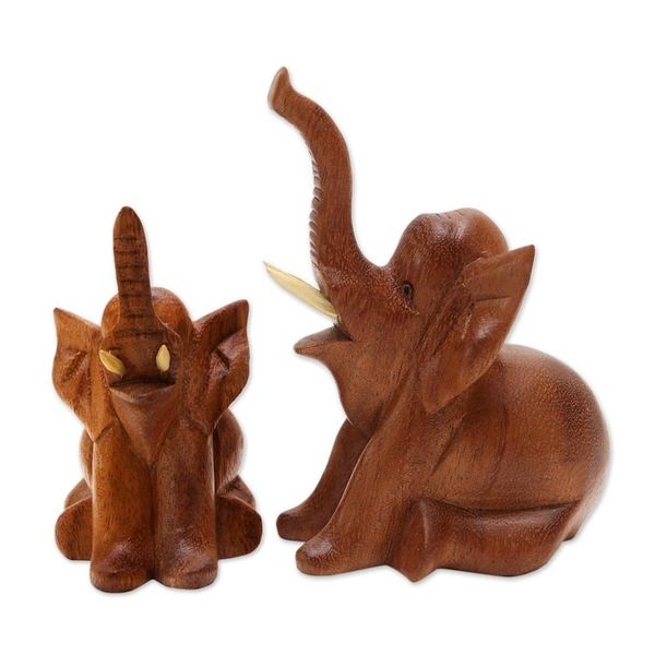 Alternate image for Hand Carved Suar Wood Elephant Statuettes Pair Play Date
