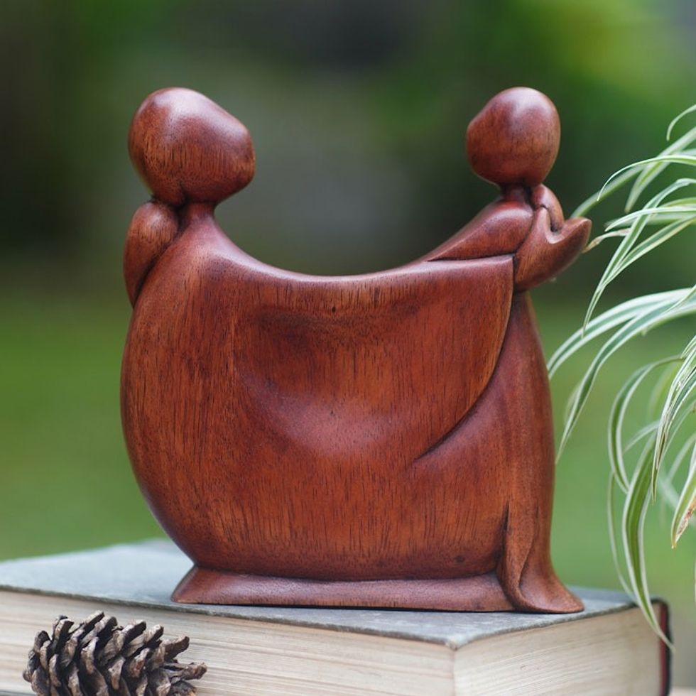 Hand-Carved Suar Wood Sculpture with a Polished Finish 'Daughter's Happiness'