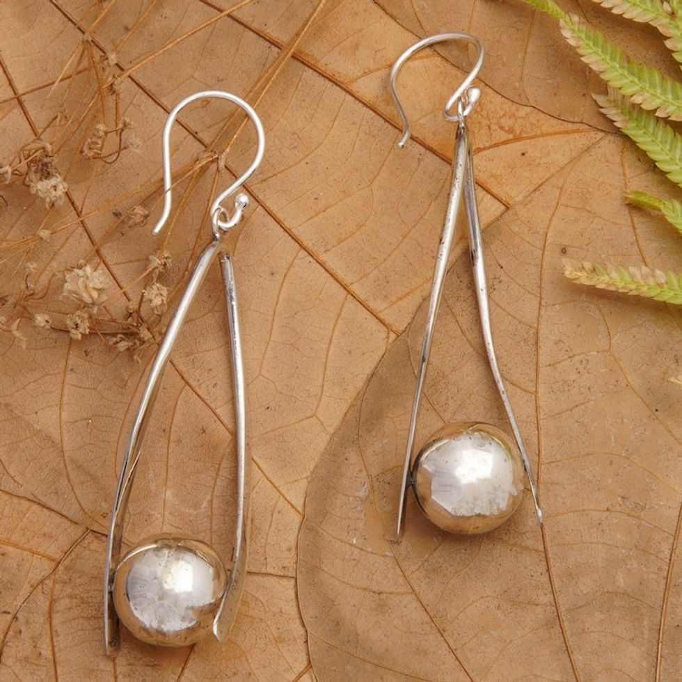 Sterling Silver Dangle Earrings in a High Polish Finish 'Earth's Protector'