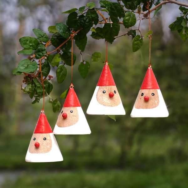 Alternate image for Set of 4 Hand-Painted Wood Santa Ornaments Made in Bali Mr. Santa