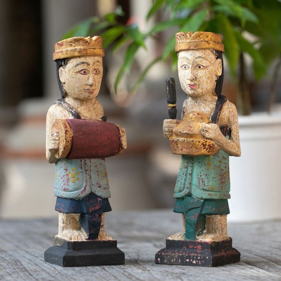 2 Wood Sculptures of Men Playing Balinese Musical Instrument 'Kempluk Players'