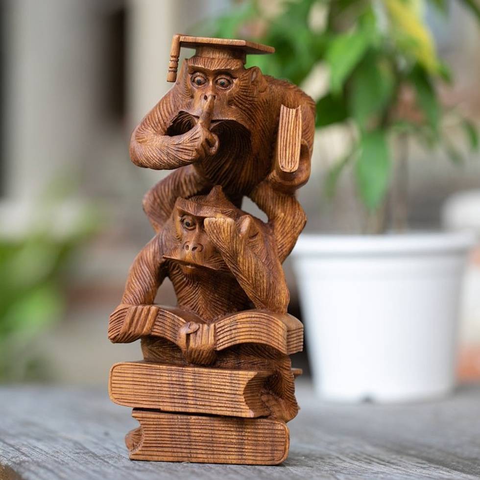 Whimsical Hand-Carved Wood Sculpture of Orangutans Studying 'Lesson to Learn'