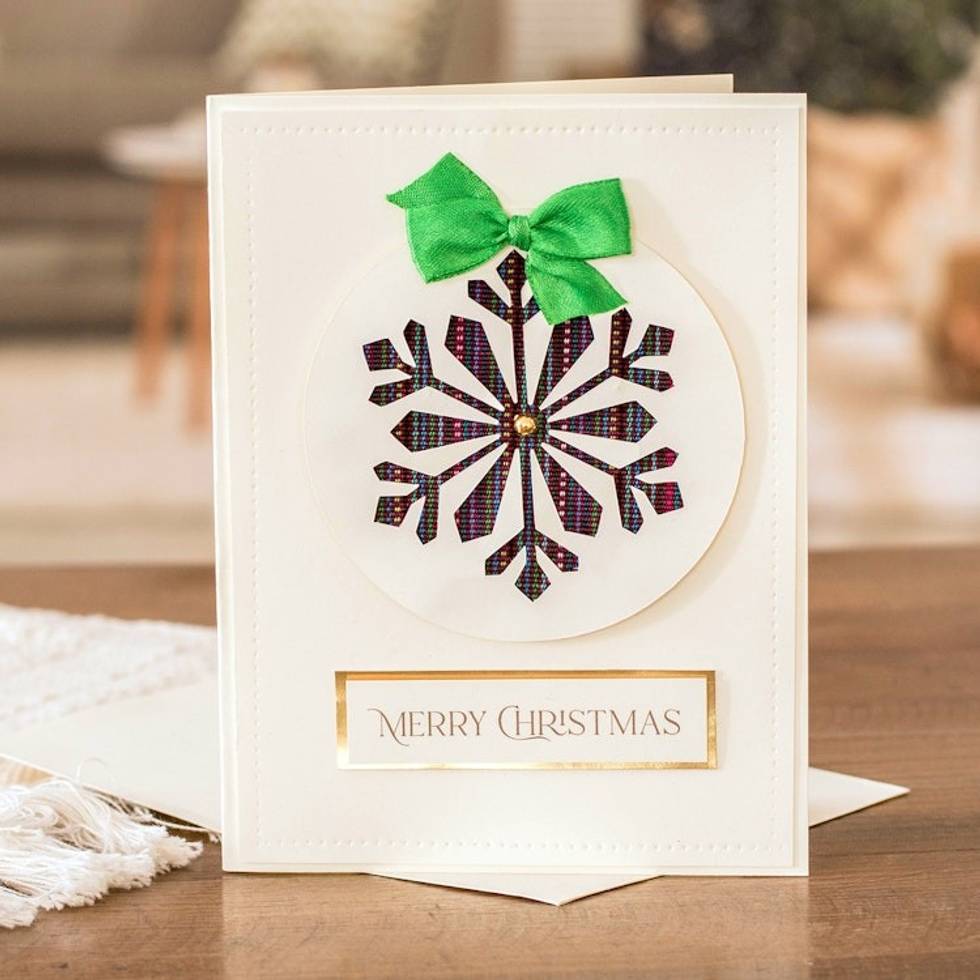 Snowflake-Themed Christmas Greeting Card with Green Ribbon 'Festive Jubilation'