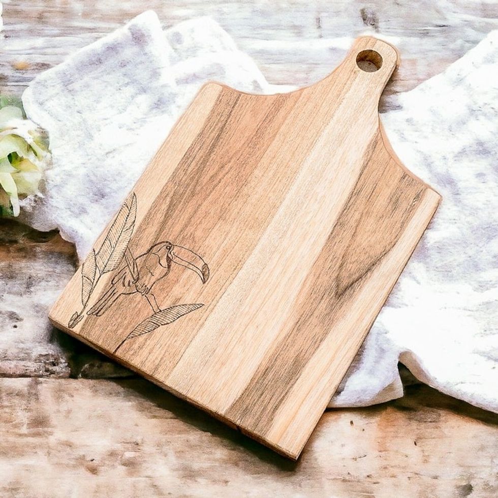 Handcrafted Laurel Wood Cutting Board with Toucan Engraving 'Toucan's Delicacies'