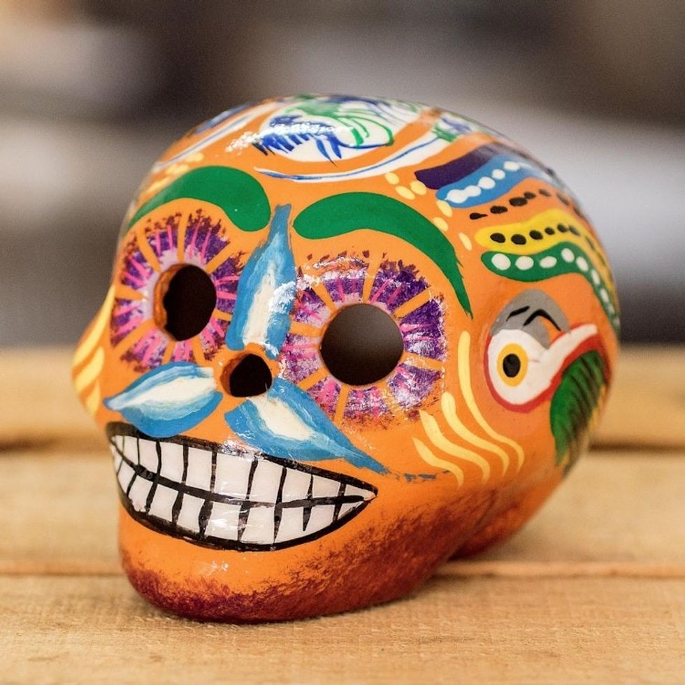 Hand-Painted Ceramic Figurine from Guatemala 'Skull with Macaws in Orange'