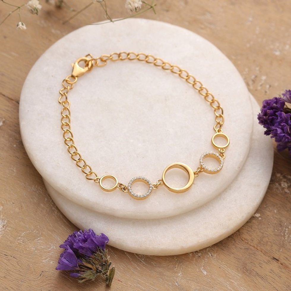 Modern 22k Gold-Plated Cubic Zirconia Pendant Bracelet 'Gleaming Cycles'