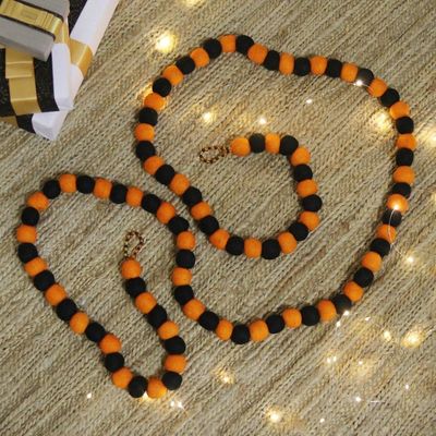 Main image for Handcrafted Orange and Black Wool Felt Pompom Garland Halloween Flare