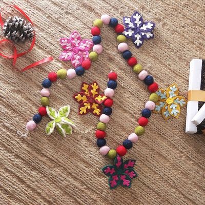 Main image for Snowflake-Themed Colorful Wool Felt Garland Made in India Snowflake Party